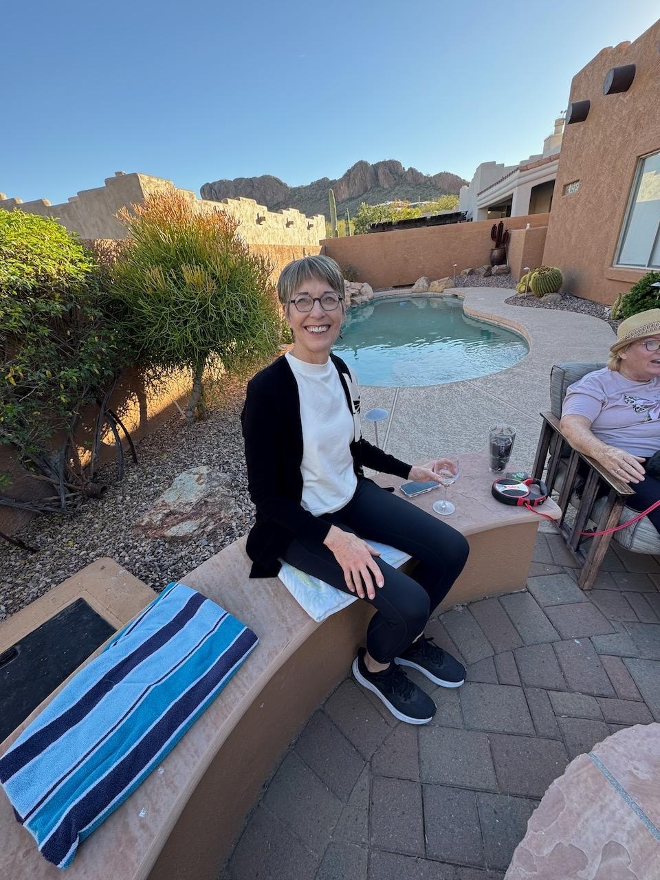 SITTING AROUND THE FIRE PIT 