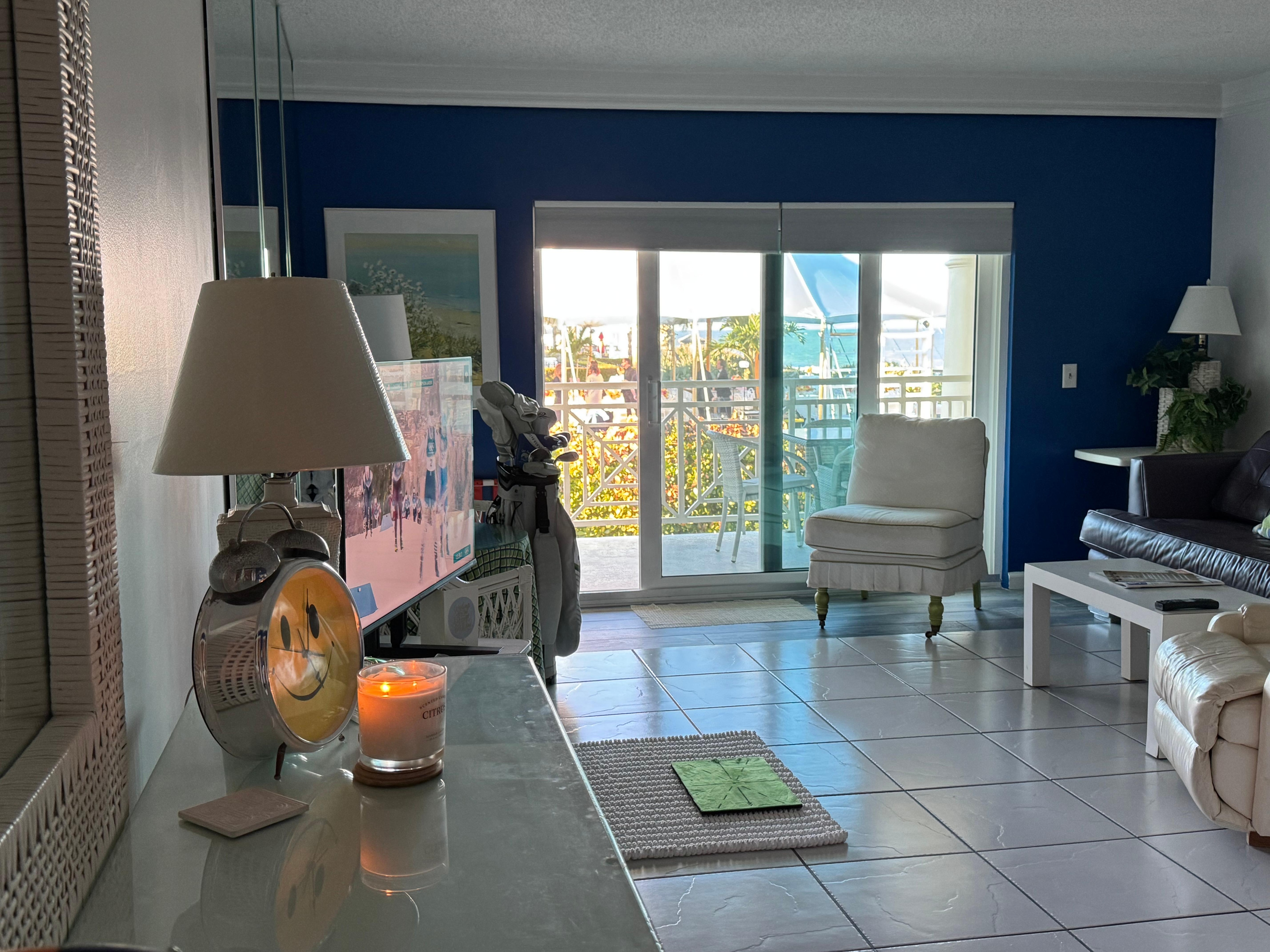 Main room with bed & living room.