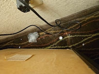 Behind bed table