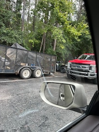 Behind the red truck was where the party was the night before