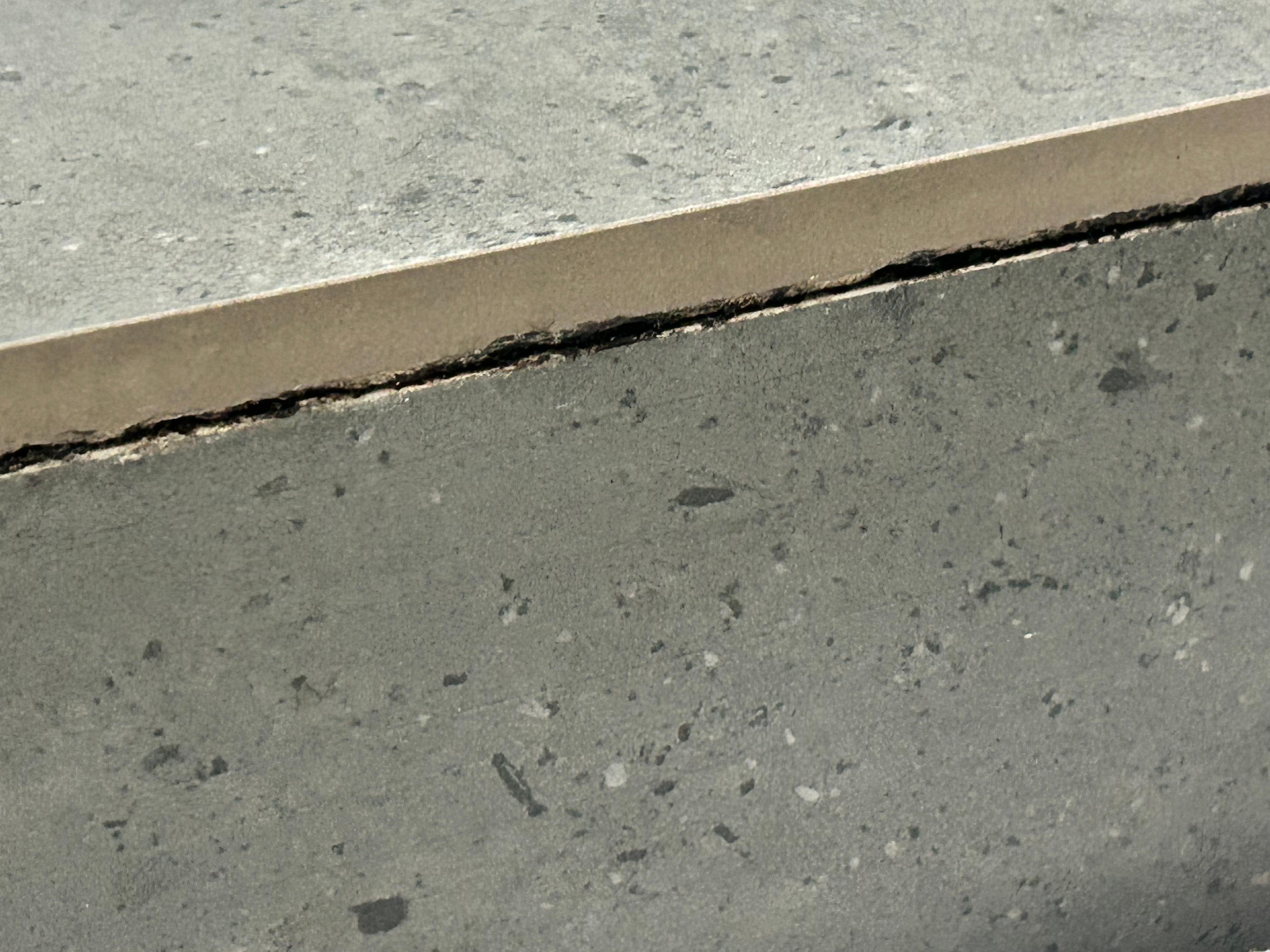 Mold at base of shower.  