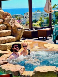 Newlyweds enjoying the jacuzzi.