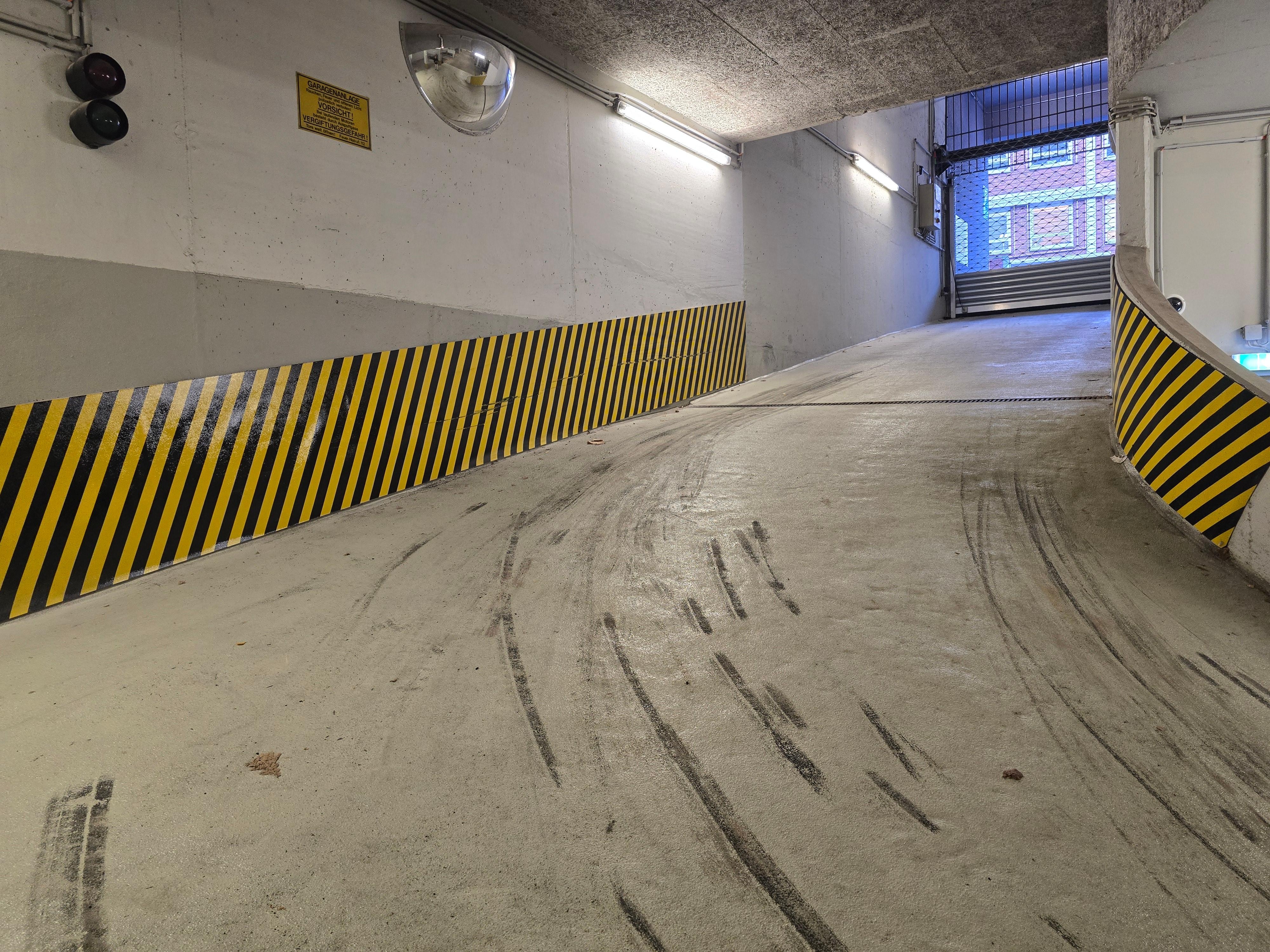 Plenty of skid marks evidence of the difficulty of exiting the parking