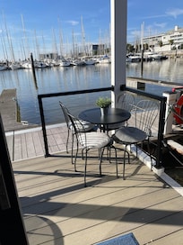 Front patio of houseboat with breakfast table!