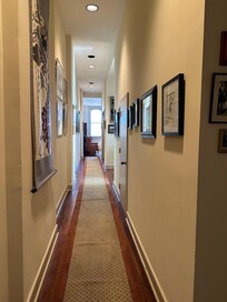 Beautiful art adorned walls of this 50-60ft entrance hall