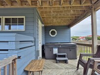 Hot tub outside master bedroom on 1st level