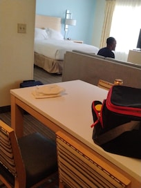 Kitchenette with seating, my hubby is chillin over there, watching pre-season