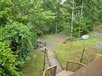 Walkway to the fire pit. Lighted at night!