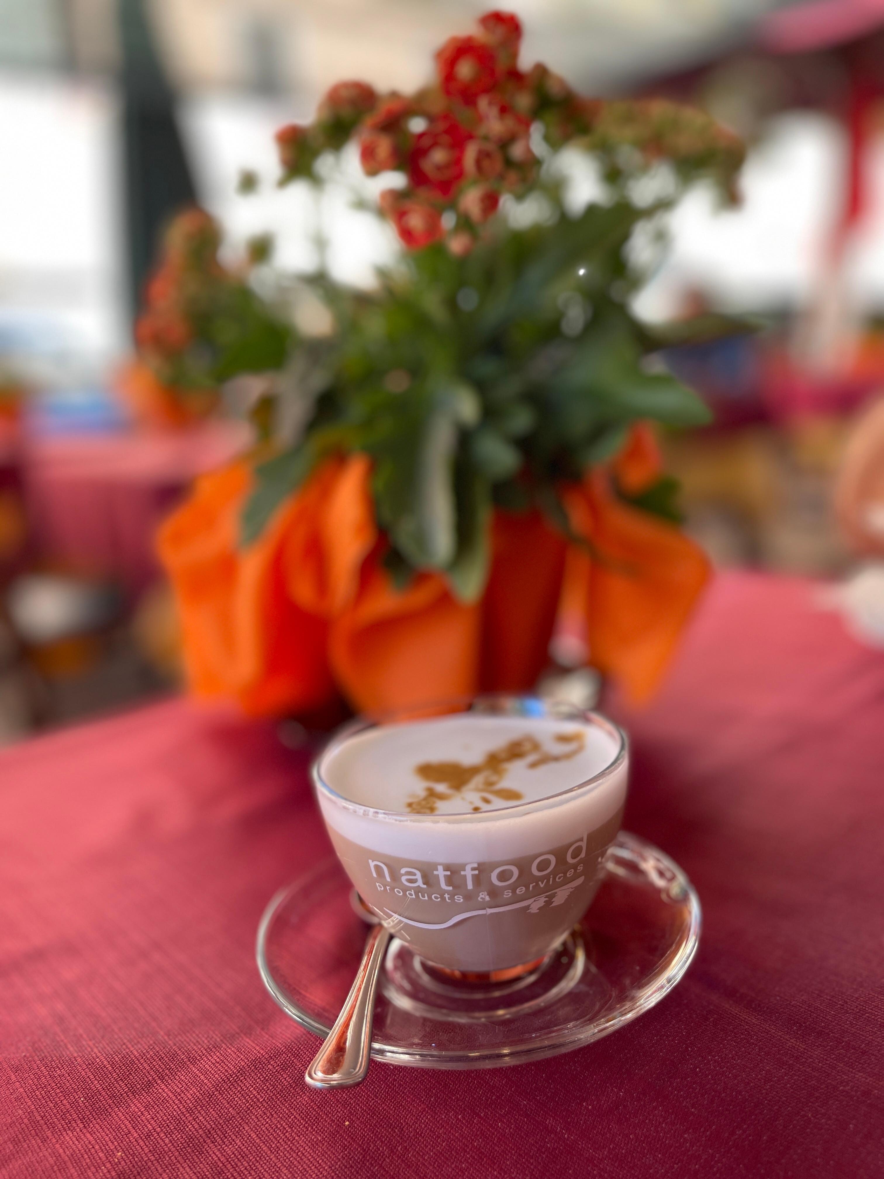 Cafe down the sidewalk about 100 yards. Latte Macciatto 