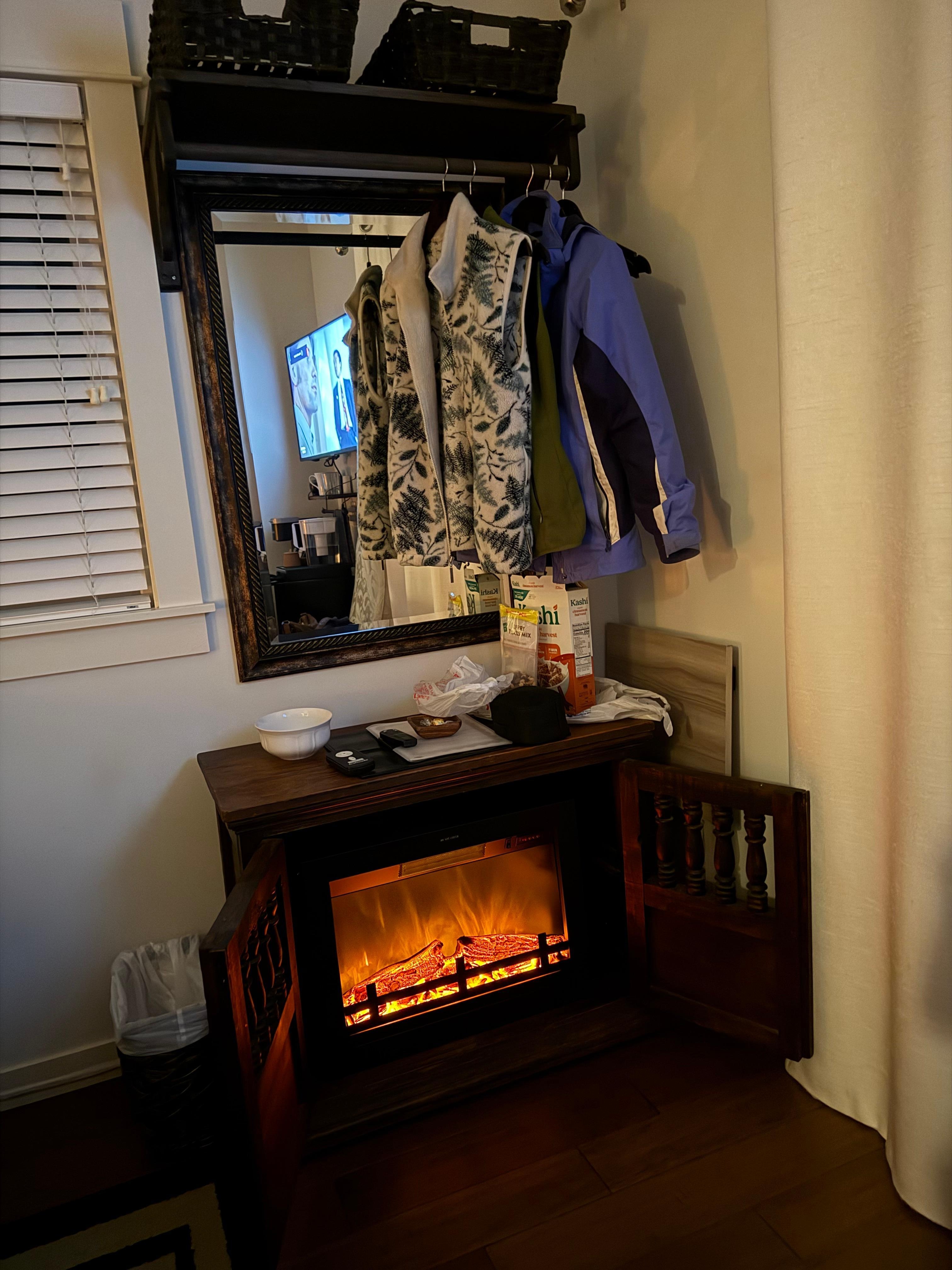She has heated floors on this winter night to keep me warm besides the heavy duty bed covers, but also this heated stove fireplace made the room warm & toasty