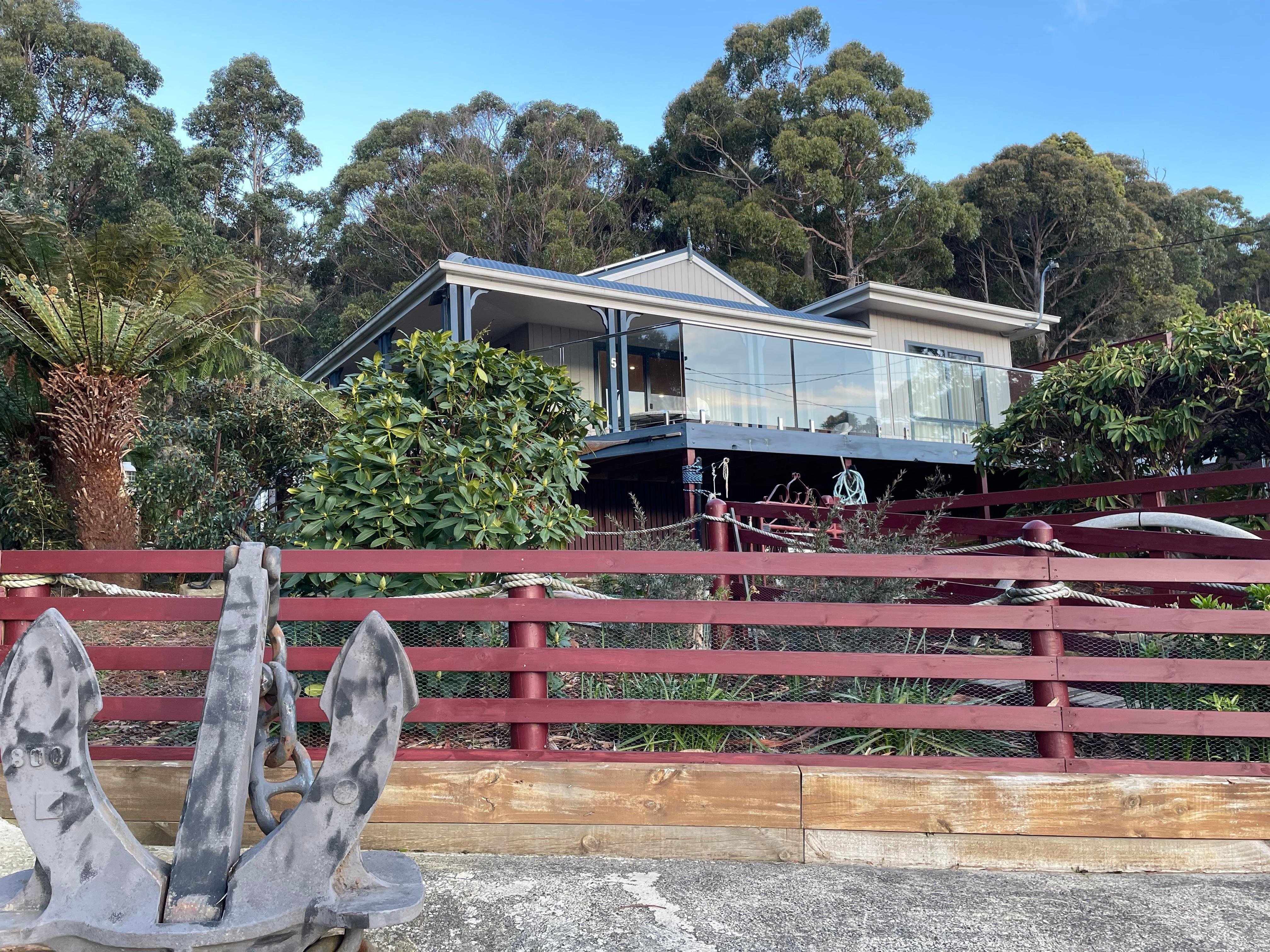 Front of home from sole use car parking space