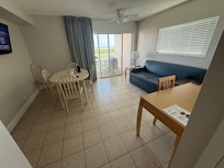 Living room area with sofa bed. Bedroom has 2 double beds. TV’s in both rooms and free internet access.