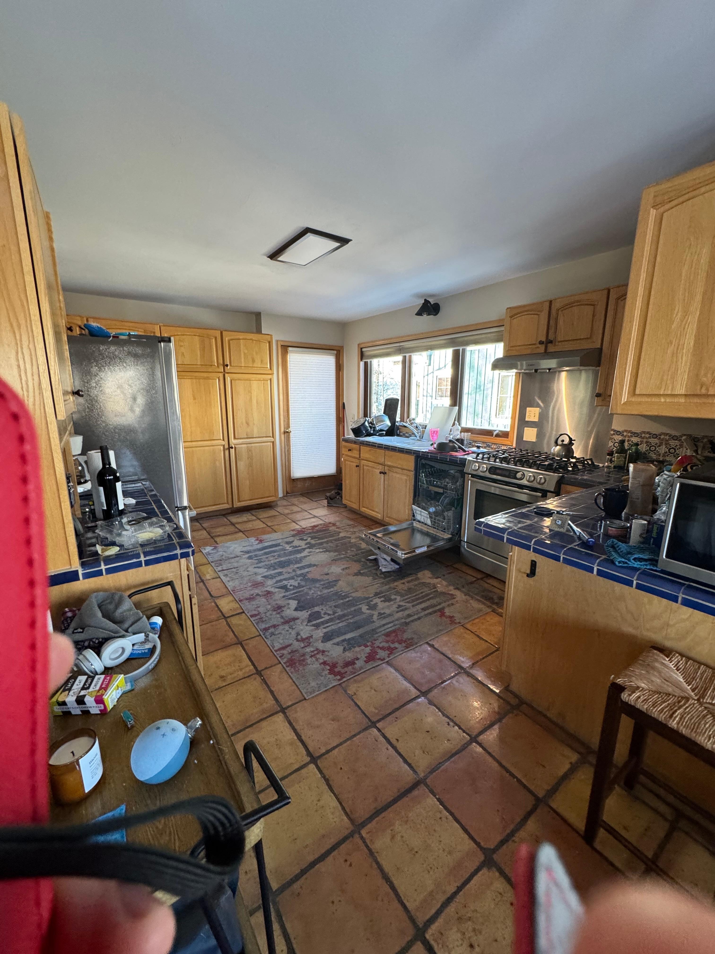 A view of the kitchen from the living room. 