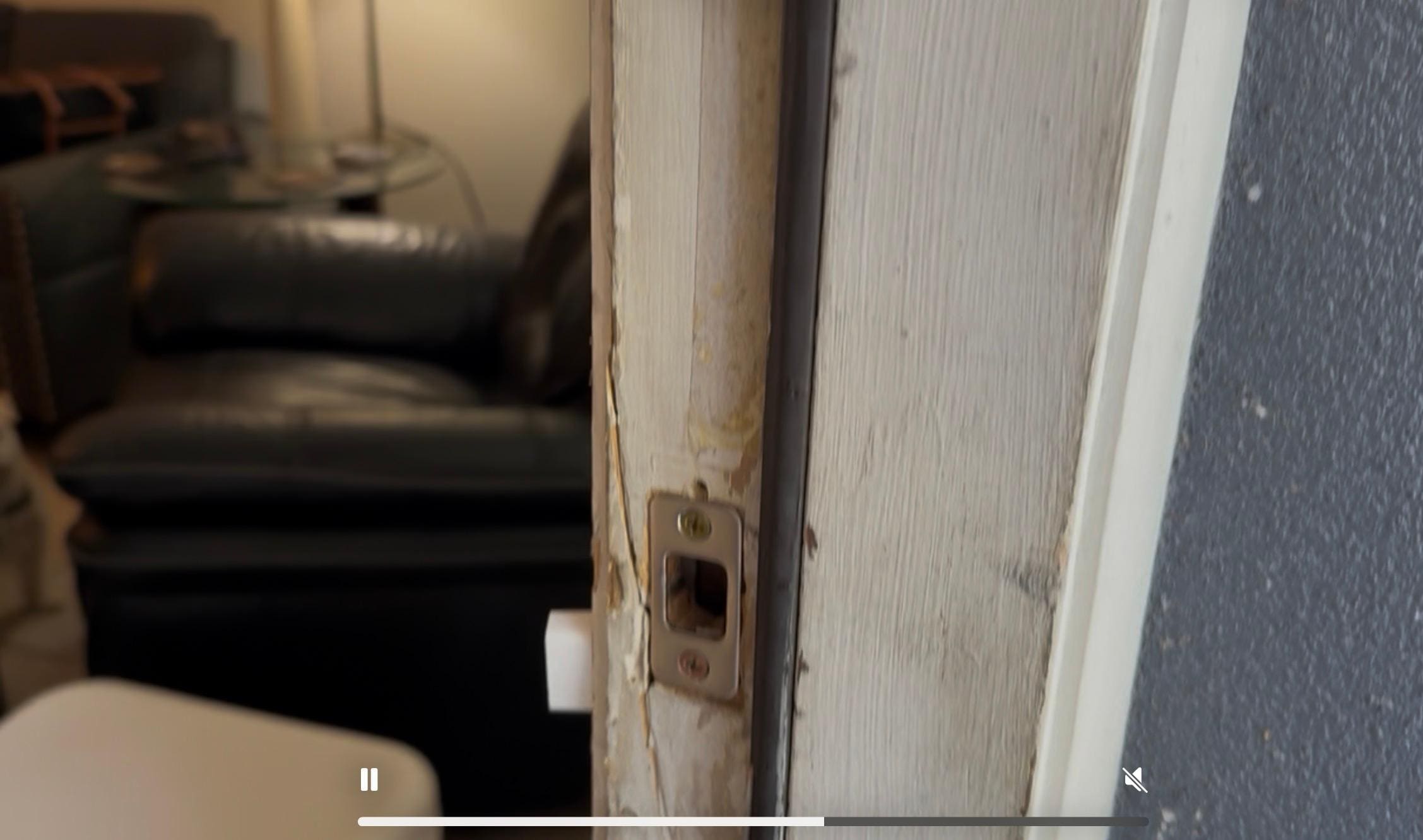 Front door jam looks kicked in and poorly repaired 