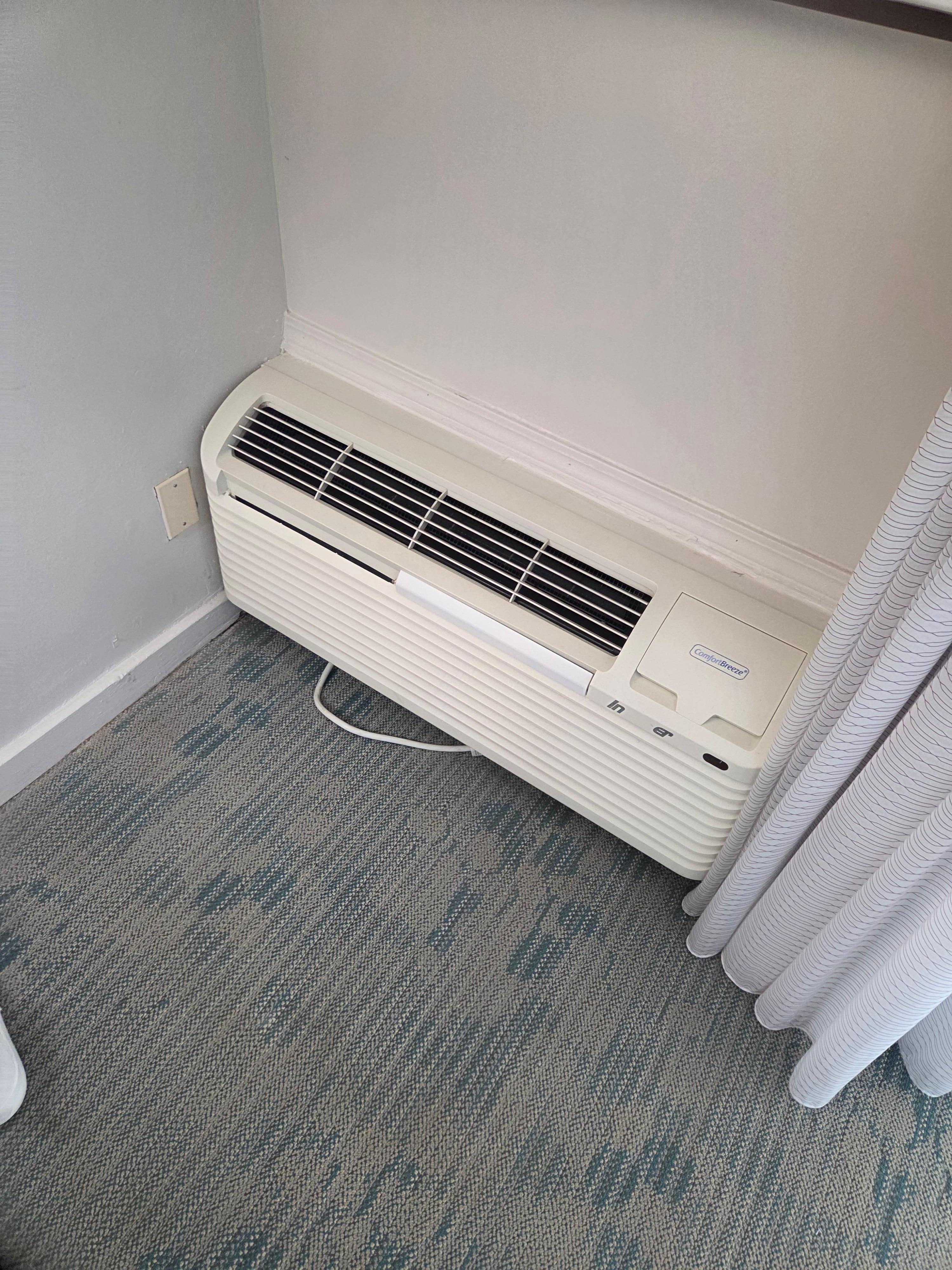 Very loud AC unit inside the room!!