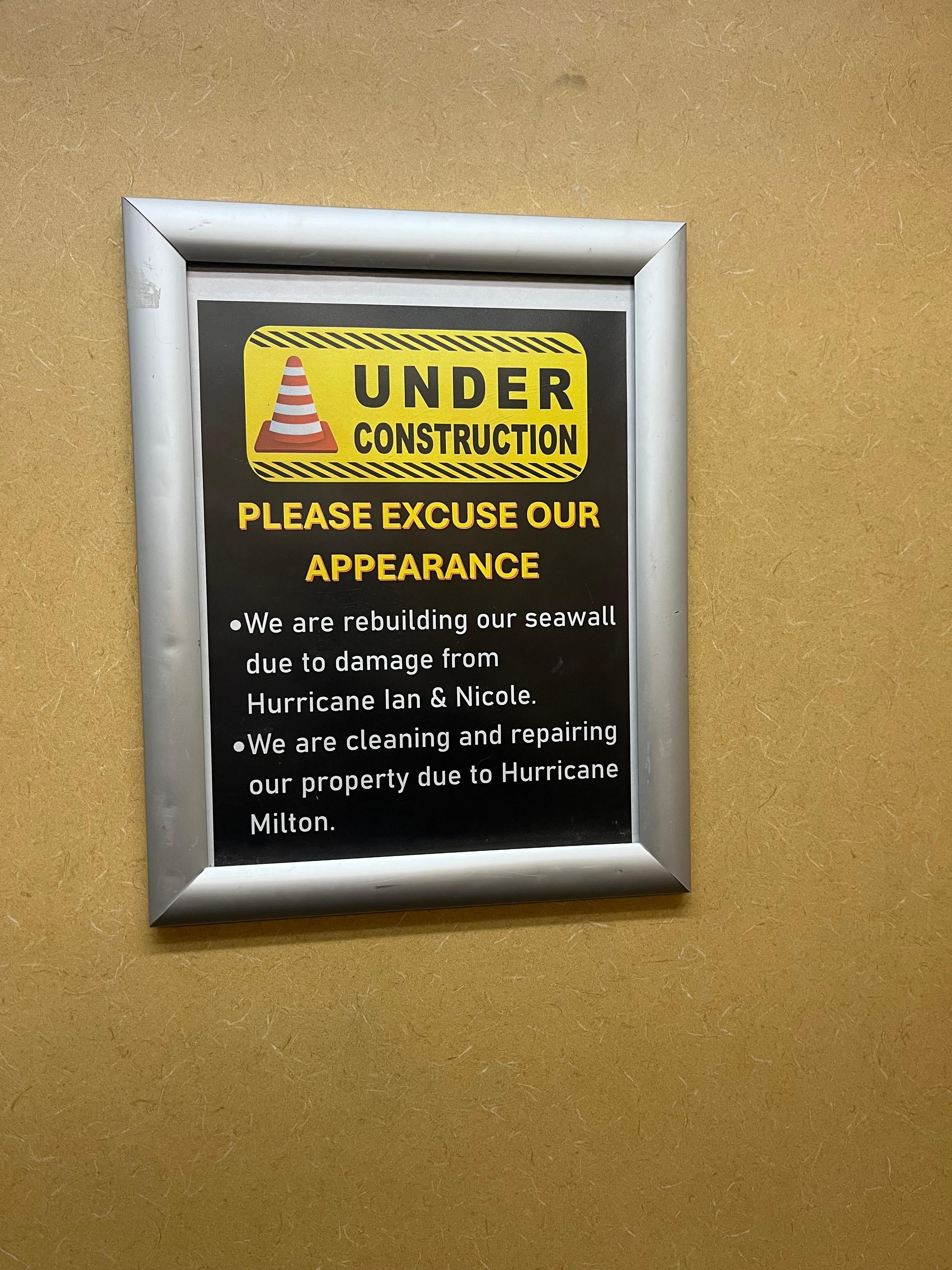 Sign posted in elevator