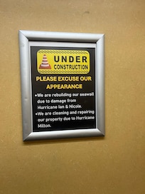 Sign posted in elevator
