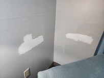 Construction going on in our room. $100 a night and this is what we got. Patches of sheet rock mud on the walls.
