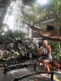 Behind bar waterfall has chairs to relax