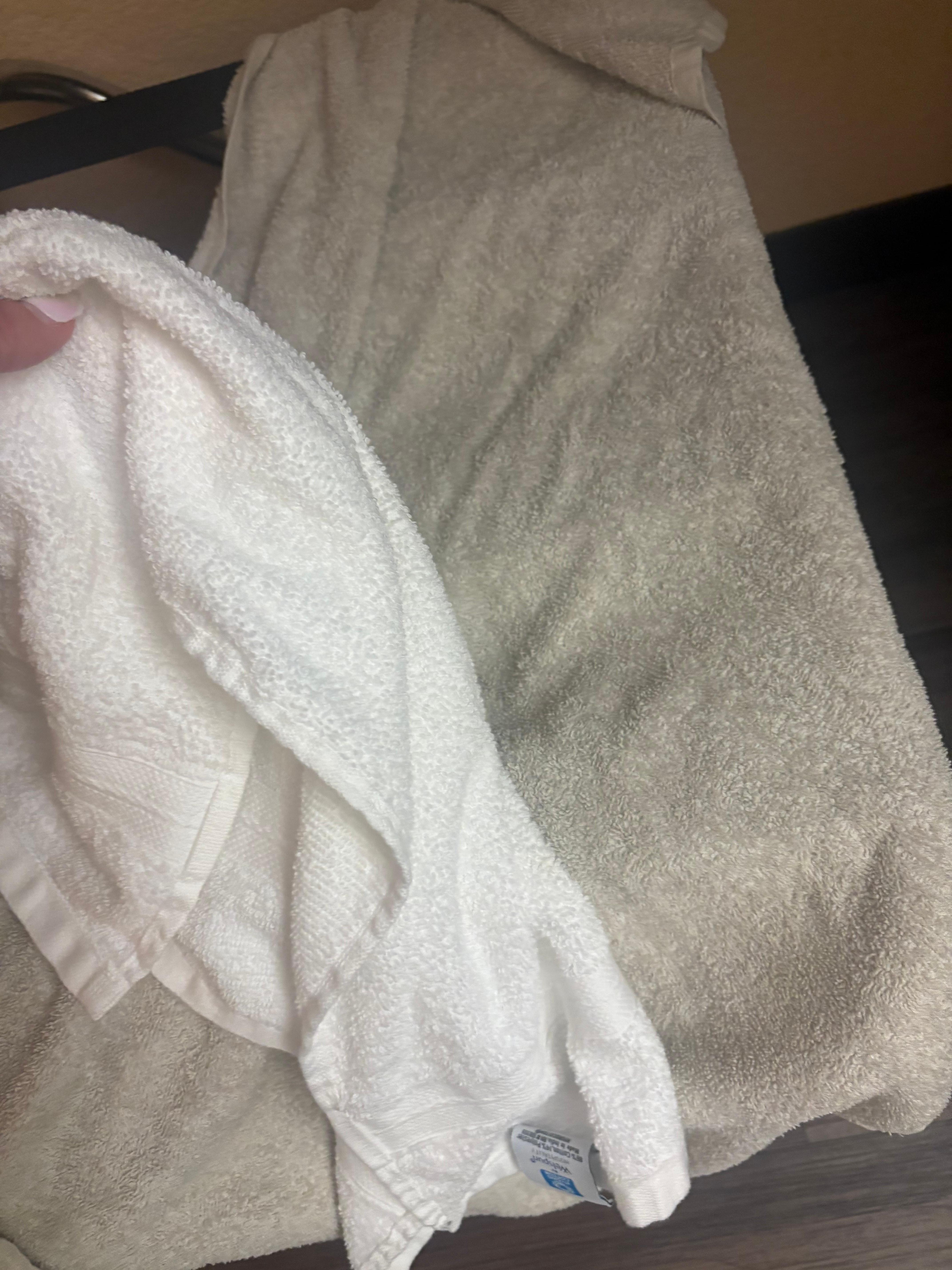 White is the hand towel, other is bath towel