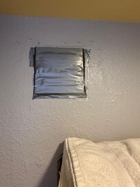 Taped up bathroom vent