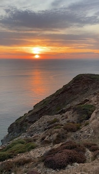 Sunset from the coastal walk. (15/20 mins from barn)