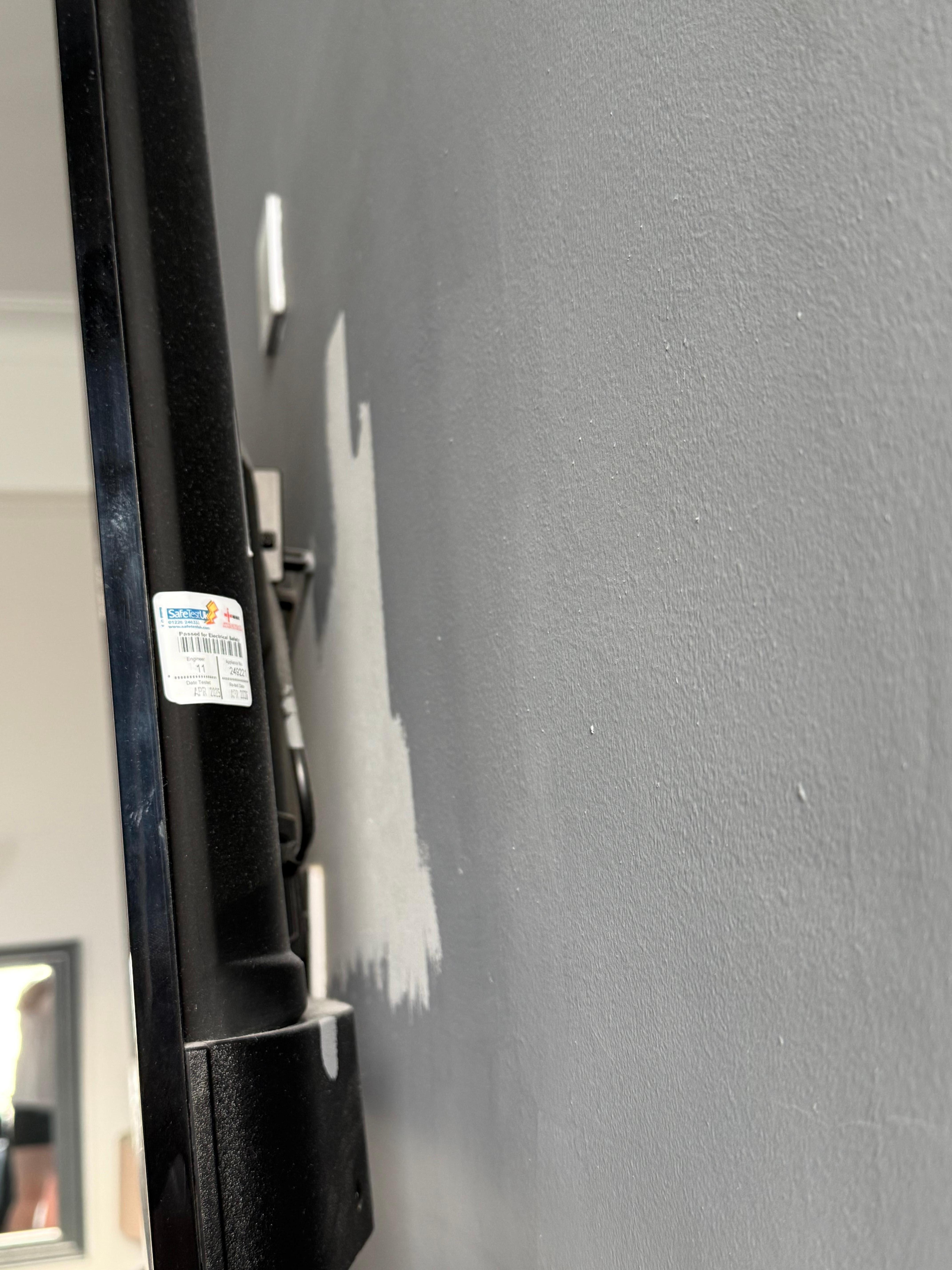 Saving paint by missing behind TV