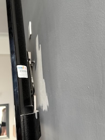 Saving paint by missing behind TV