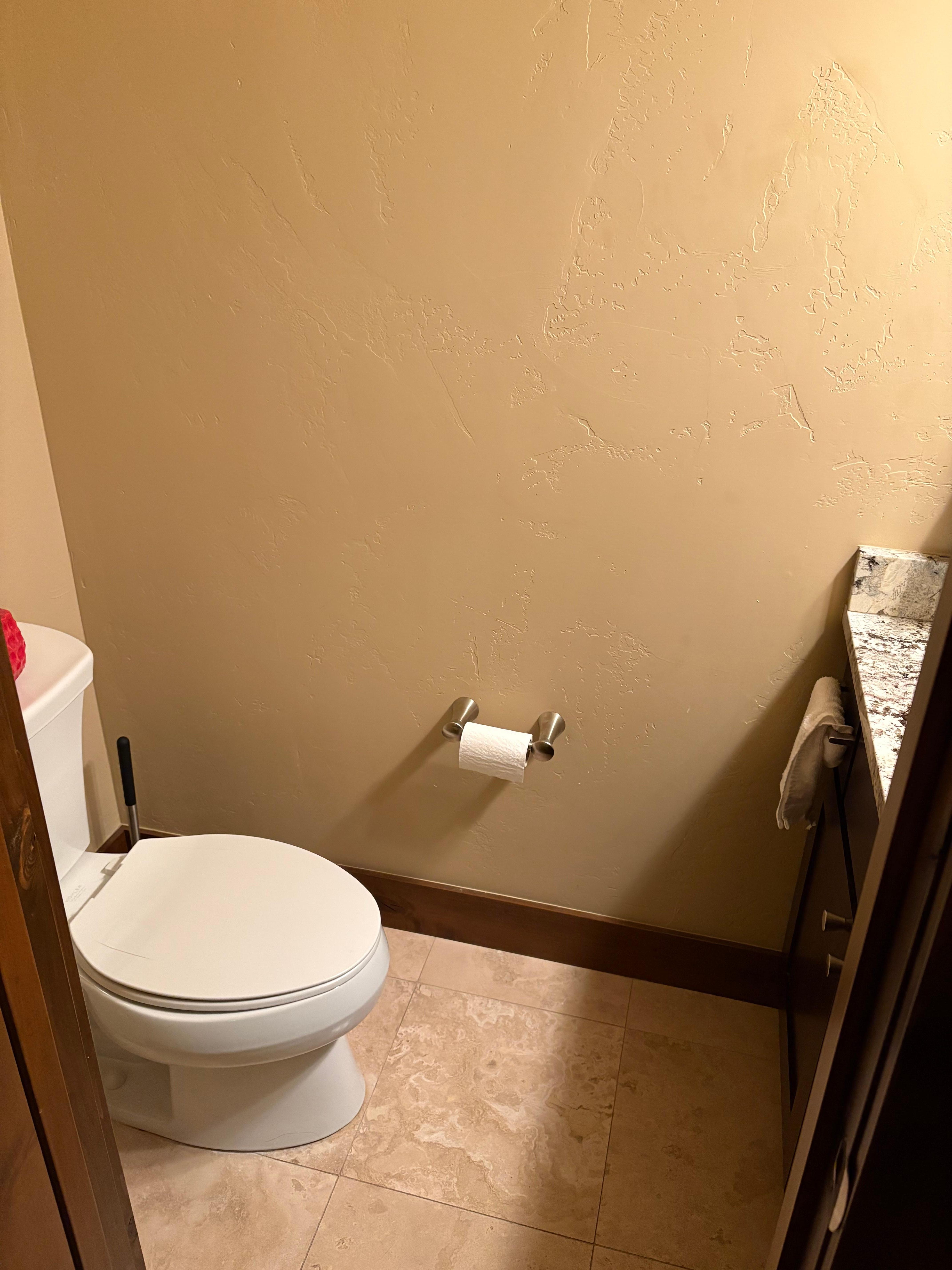 Sink and toilet in basement. Not a full bath