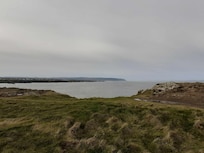 View from Ramore Head back towards Inn on the Coast (we could see this from room)