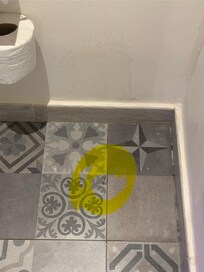 Washroom floor with pin