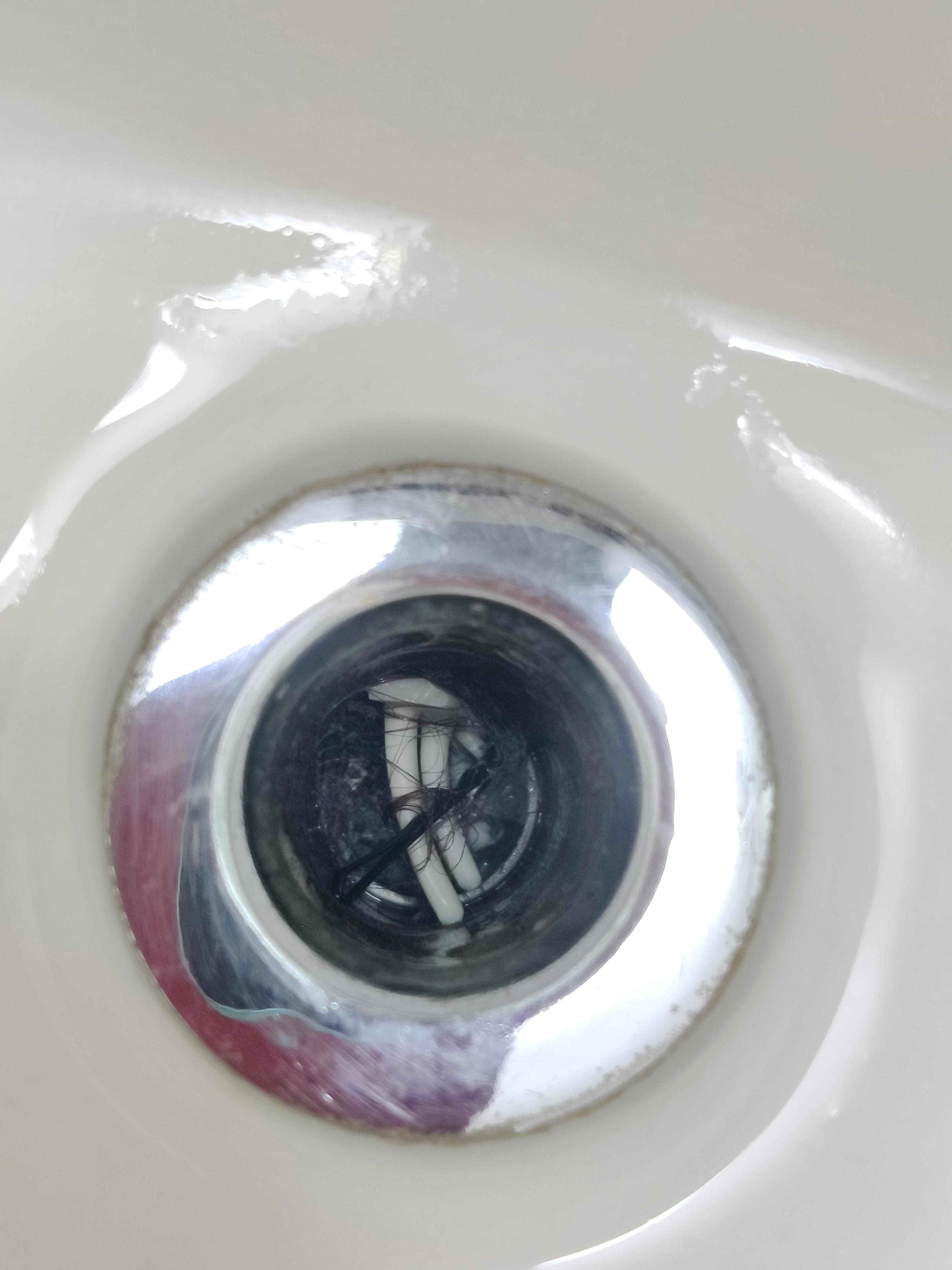 Hair in sink drain from prior guests, and no drain cover