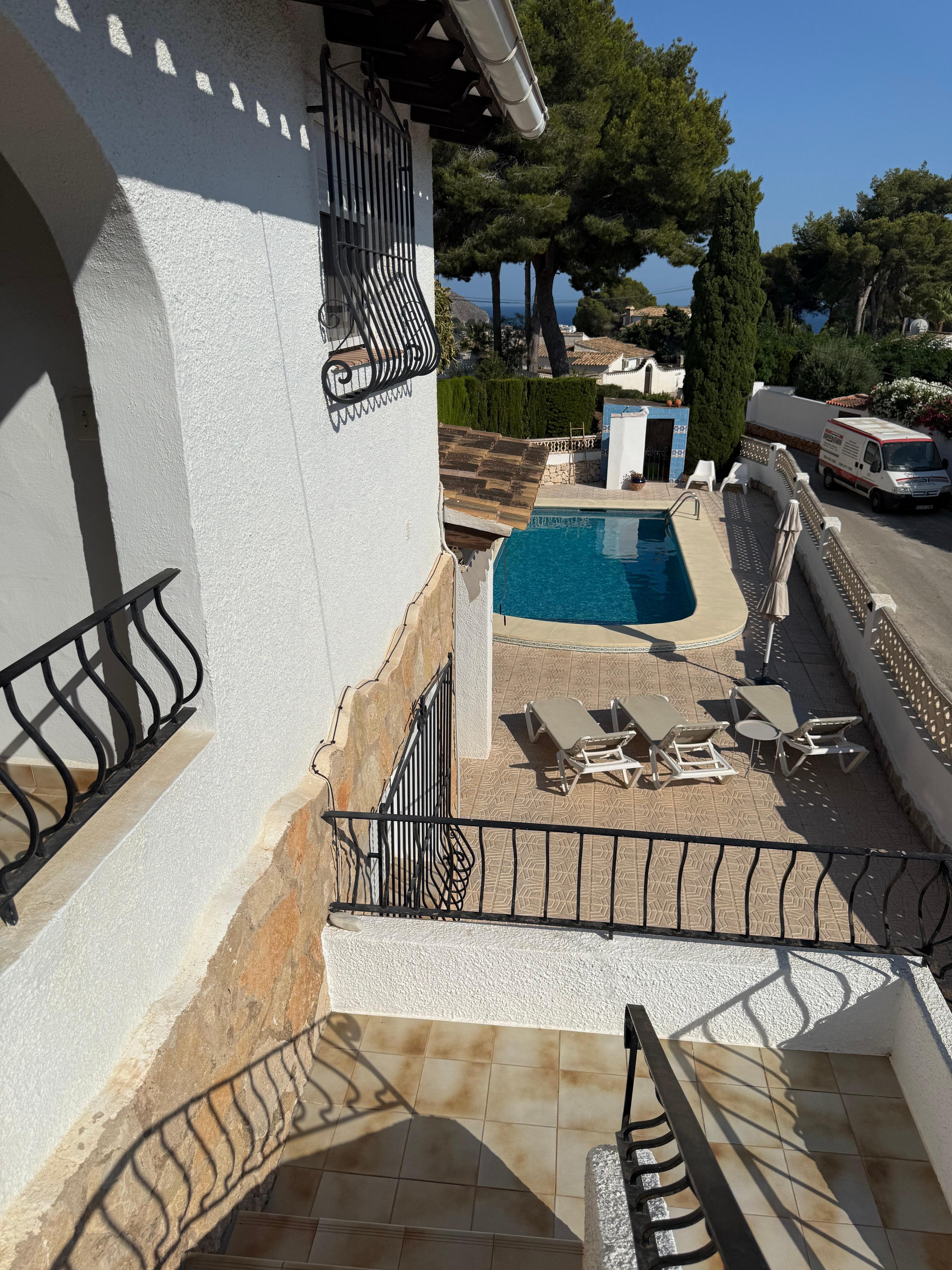 First floor looking down to the pool area.