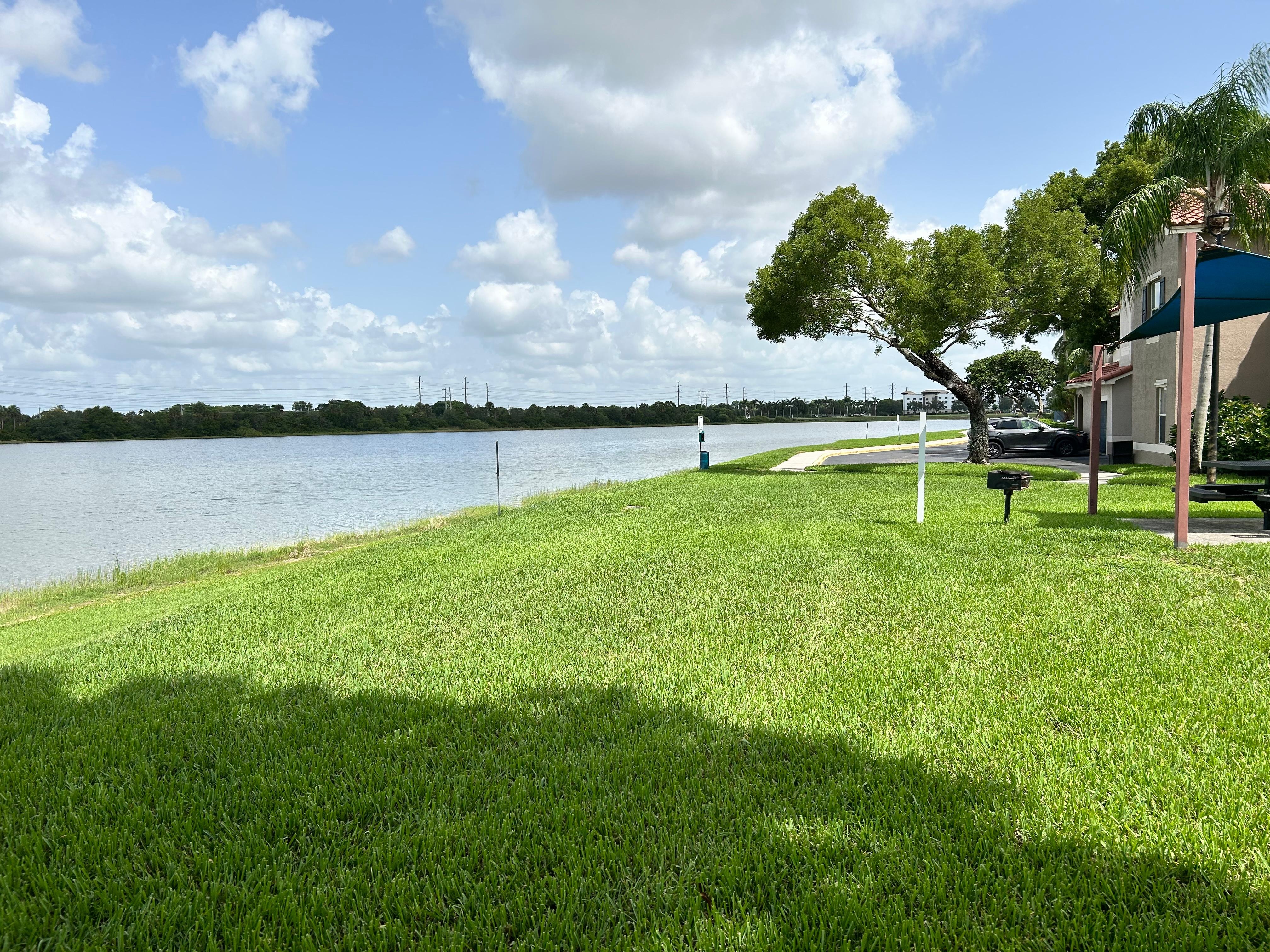The lake has a walking trail and is right next to the pool