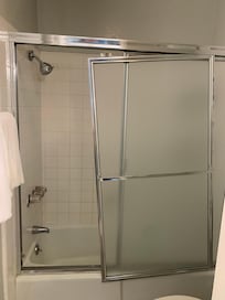 Downstairs shower door fell off the track.