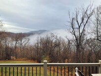 Cloud hanging in the valley