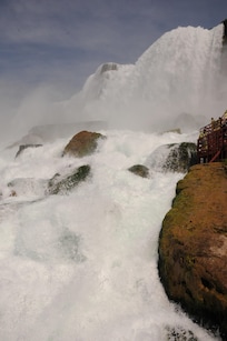 Awesome ;power of the falls. We must have great faith in engineers to walk that structure in the Cave of the Winds tour!