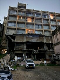 This is the condition of the hotel from behind. This view is from the parking lot of the hotel.