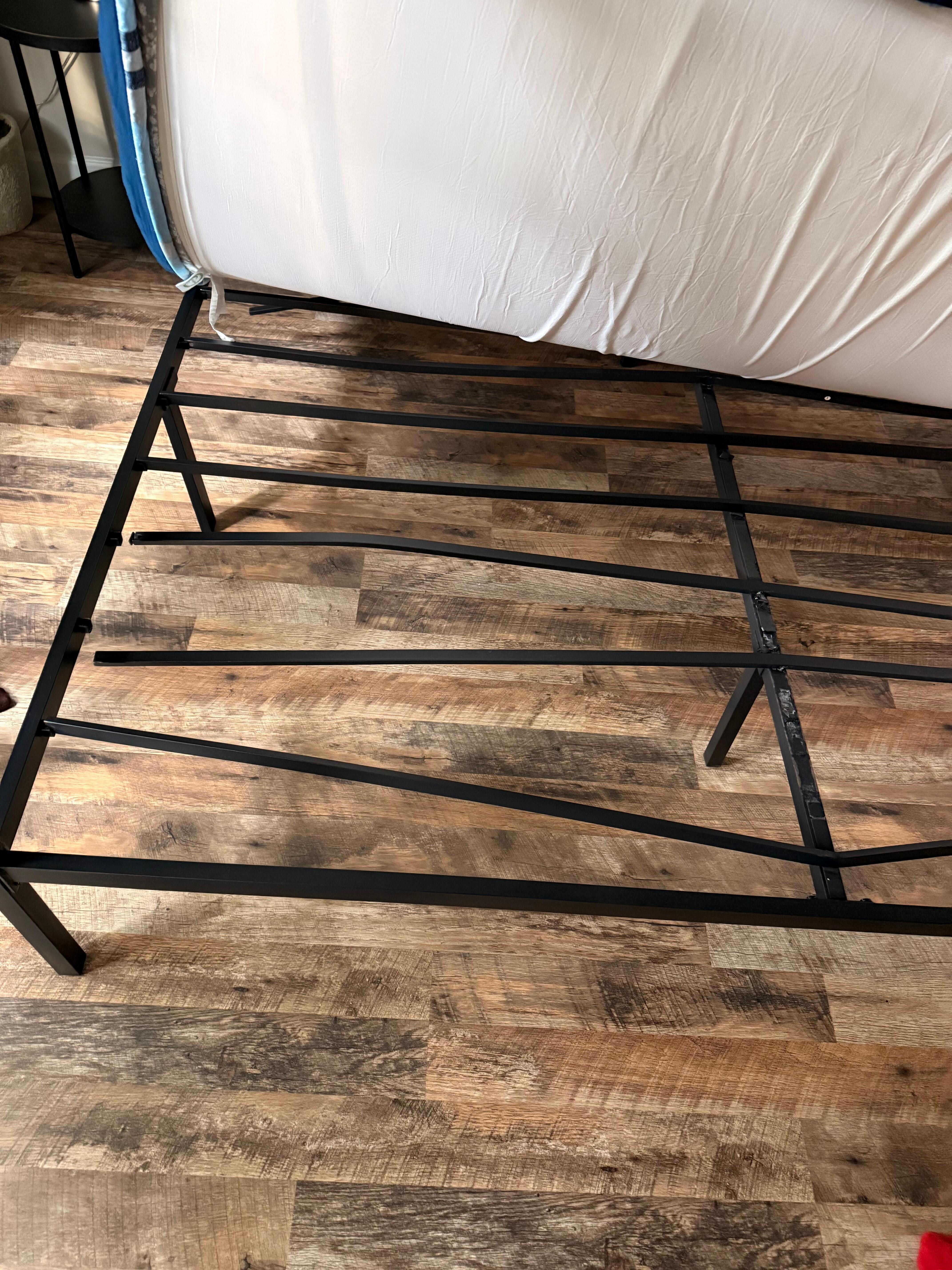 Broken bed frame in bedroom 2