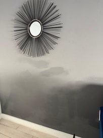 Awful patch job on all the walls, pretty embarrassing