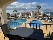 Overlooking the pool from our balcony