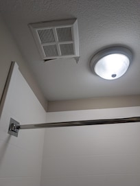 Ceiling peeling from vent in bathroom