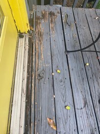 Holes in the decking on the balcony