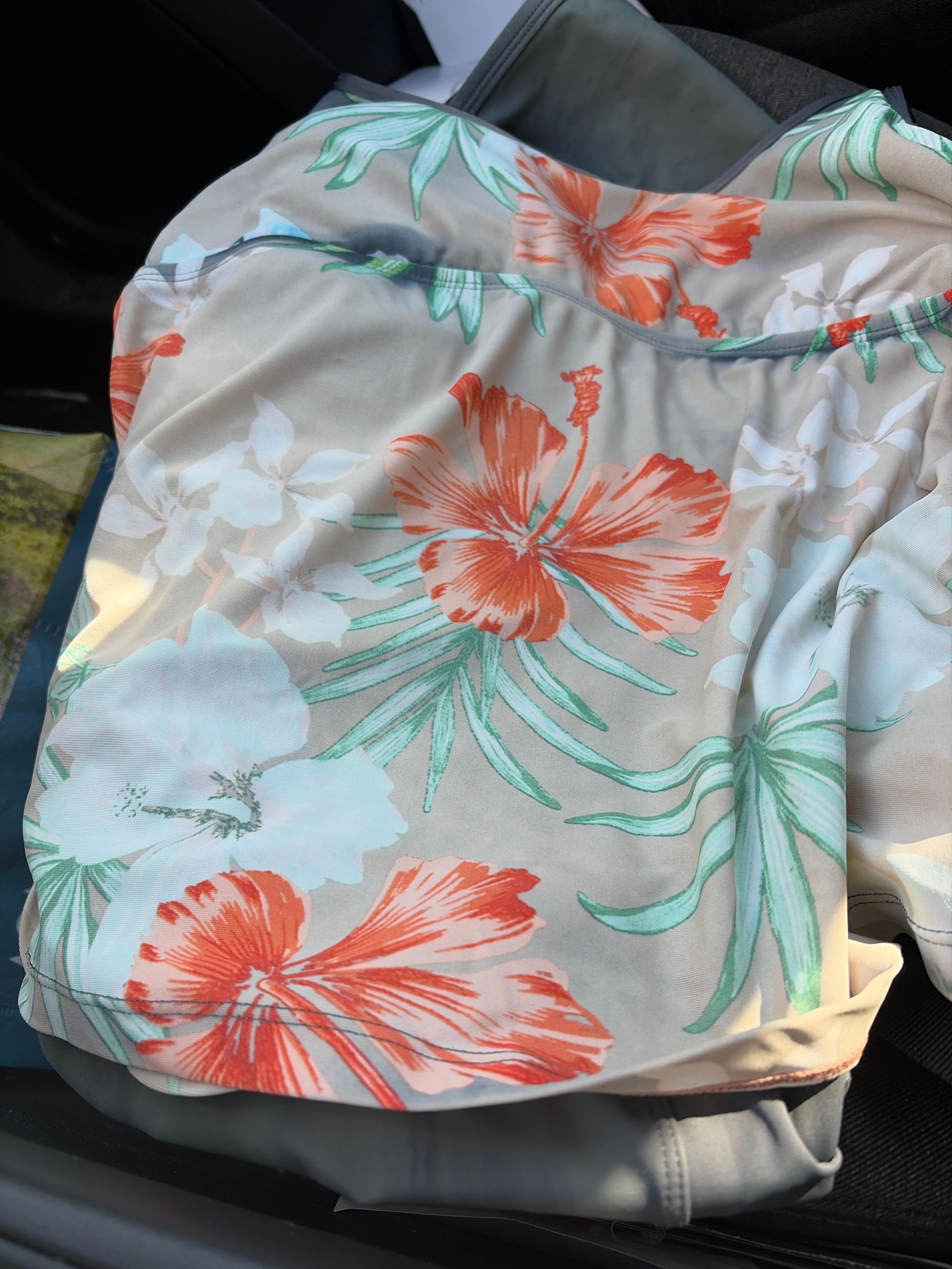 This top was solid gray with bright orange and green floral patterns before the hot tub.