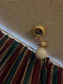 Live wires hanging from fixture