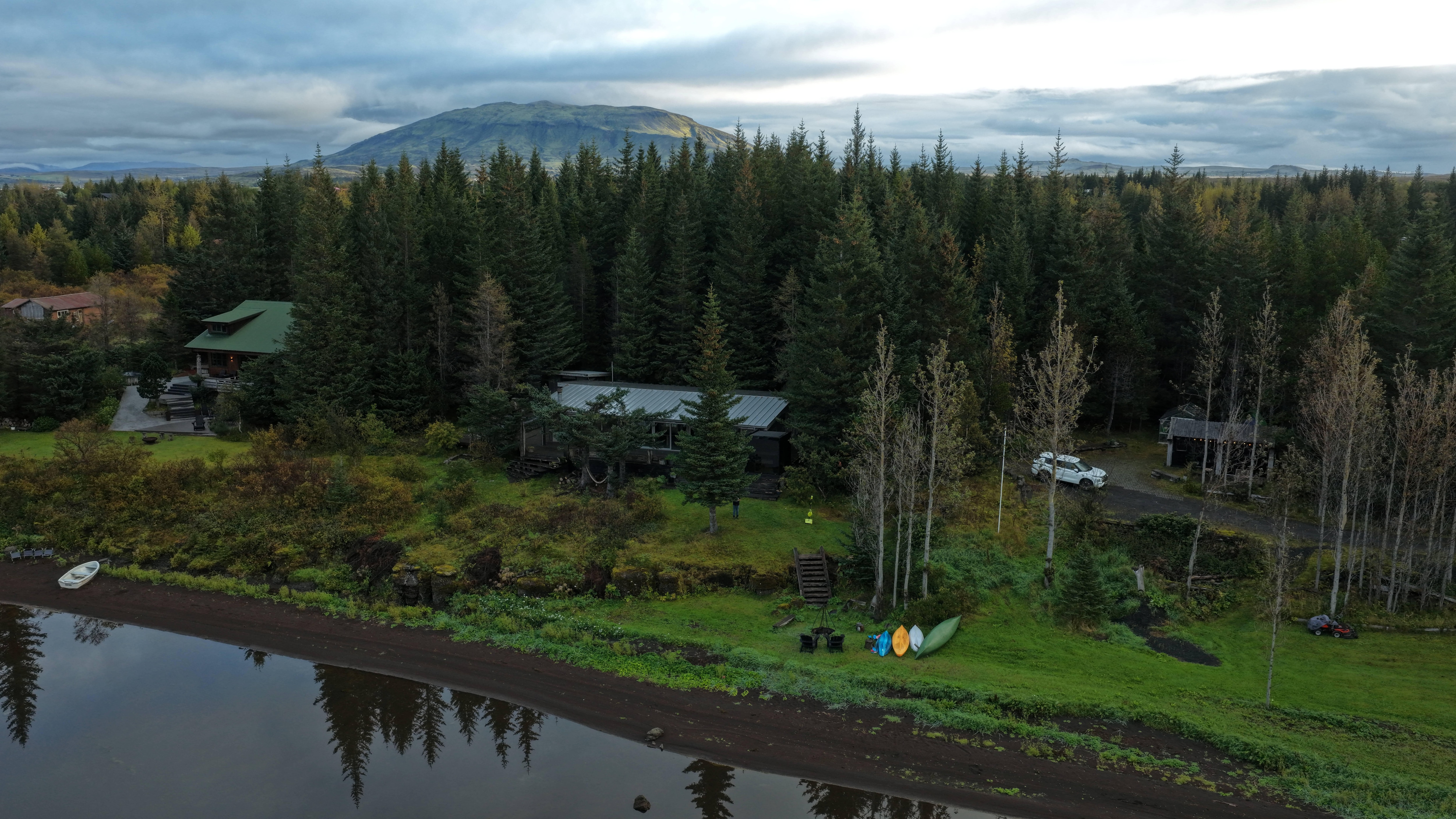 Drone shot of back of house, beach and surrounding area