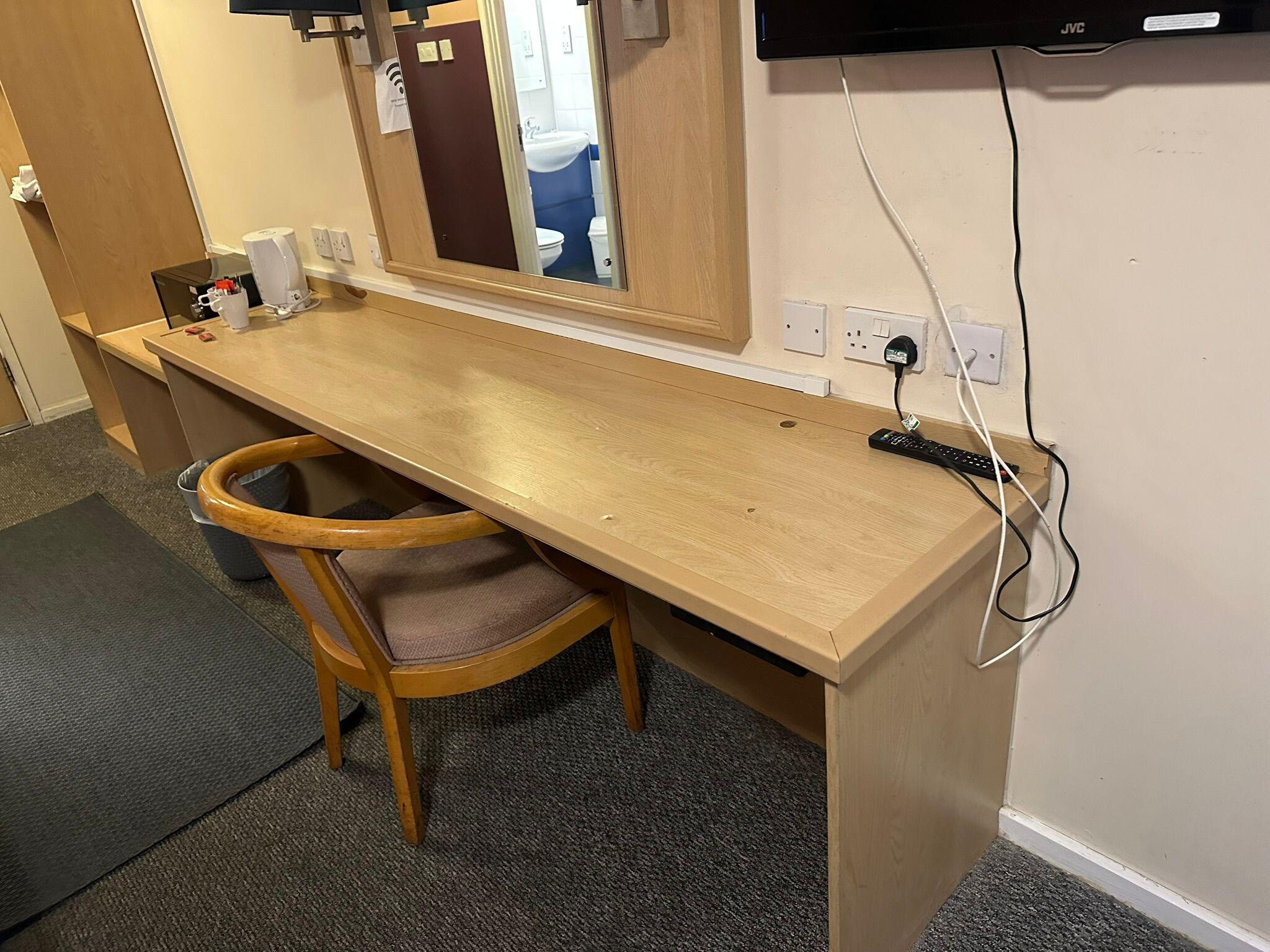 The desk/table was dirty and had not been cleaned