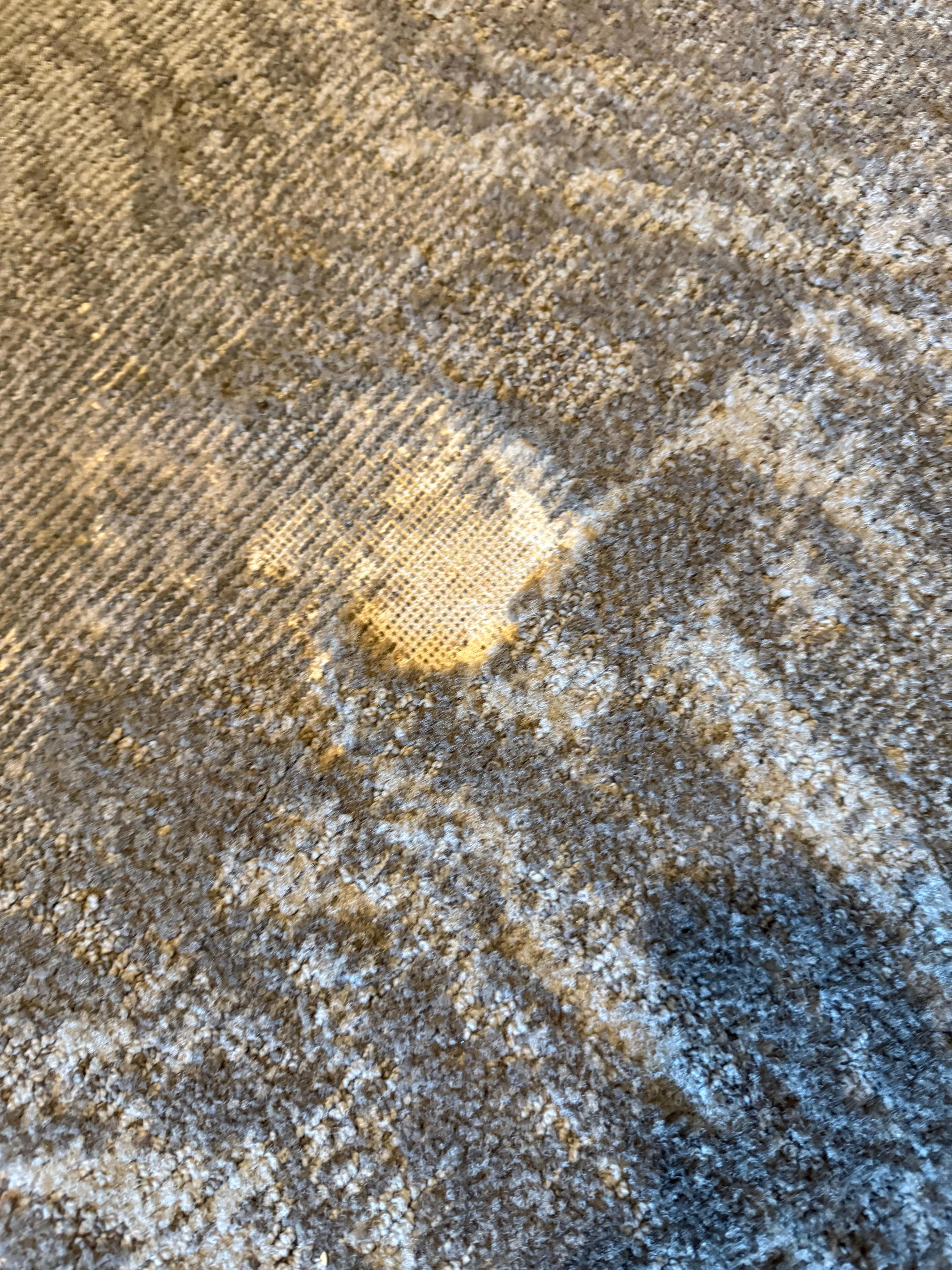 Holes in carpeting