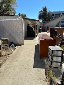 pool is closed and area filled with old furniture/junk
