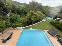 Looking down at pool from upstairs balcony